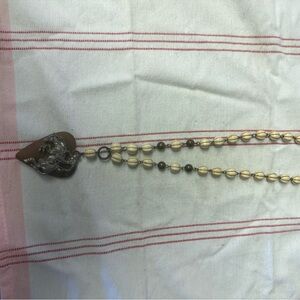 Elegant Beaded Necklace with Heart Pendant